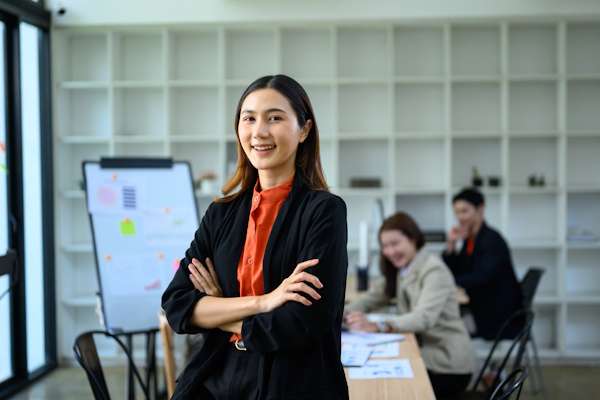 confident professional woman posing with arms cros 2026 09 25 05 55 09 utc